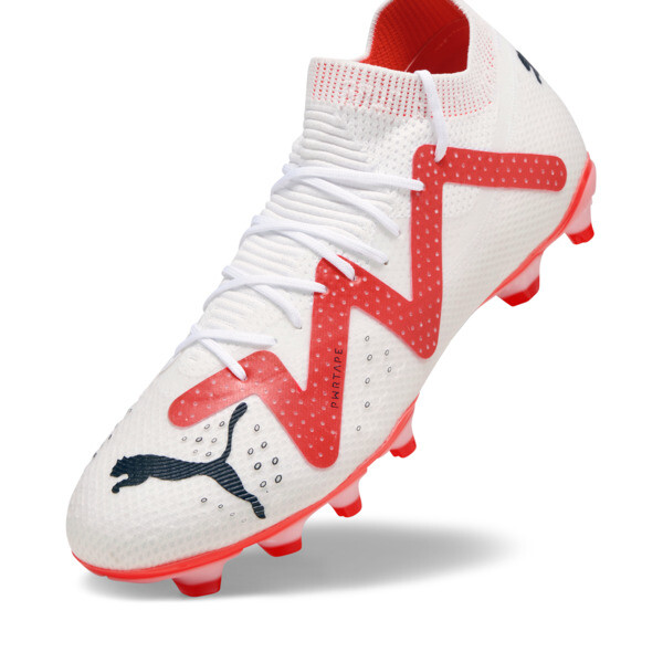 Red and white football boots on sale
