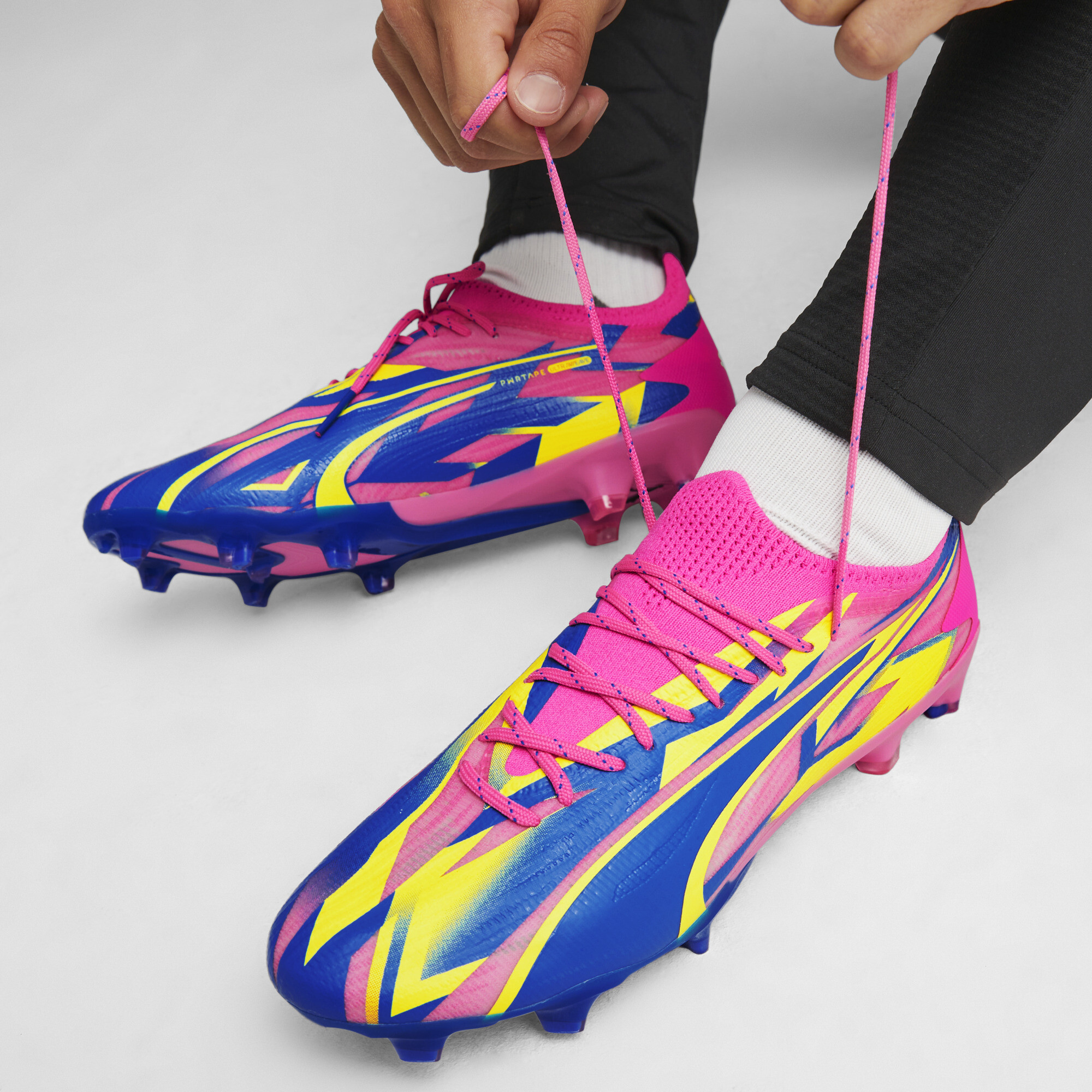 Men's PUMA ULTRA ULTIMATE ENERGY FG/AG Football Boots In Pink, Size EU 46