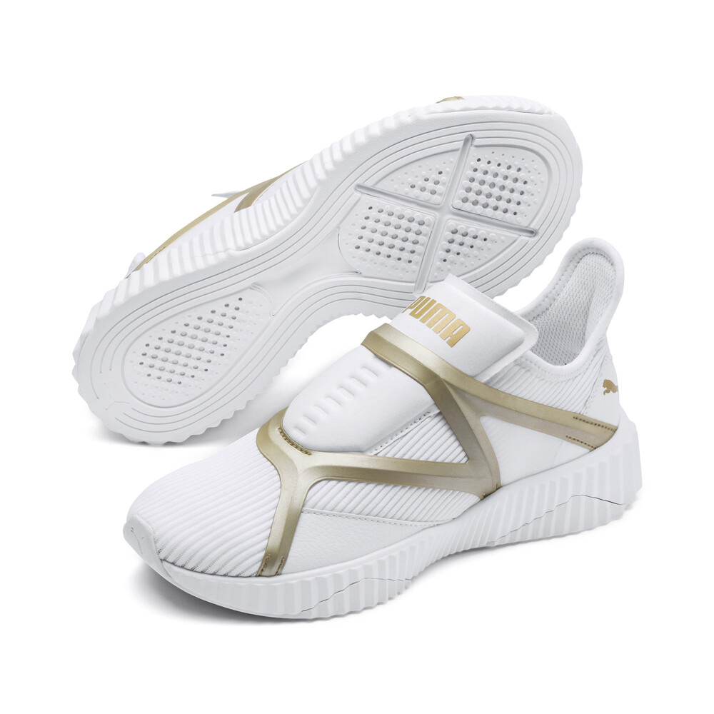 

PUMA - female - Кроссовки Defy Cage Wn's – Puma White-Gold –, Белый