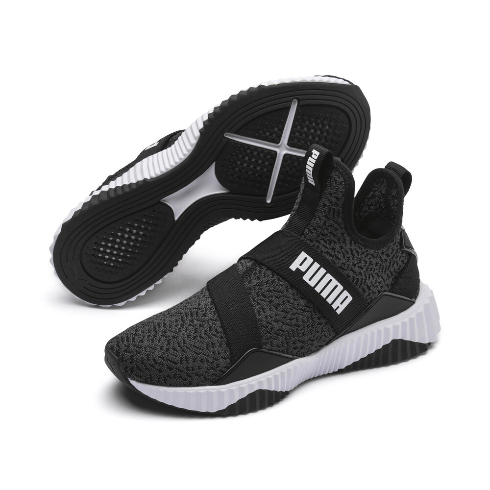 defy mid women's training shoes