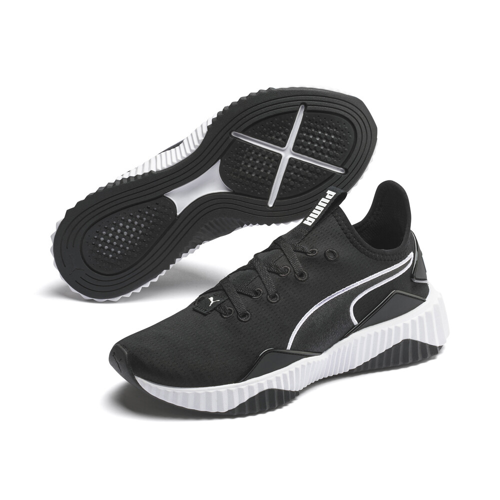 puma defy black and white