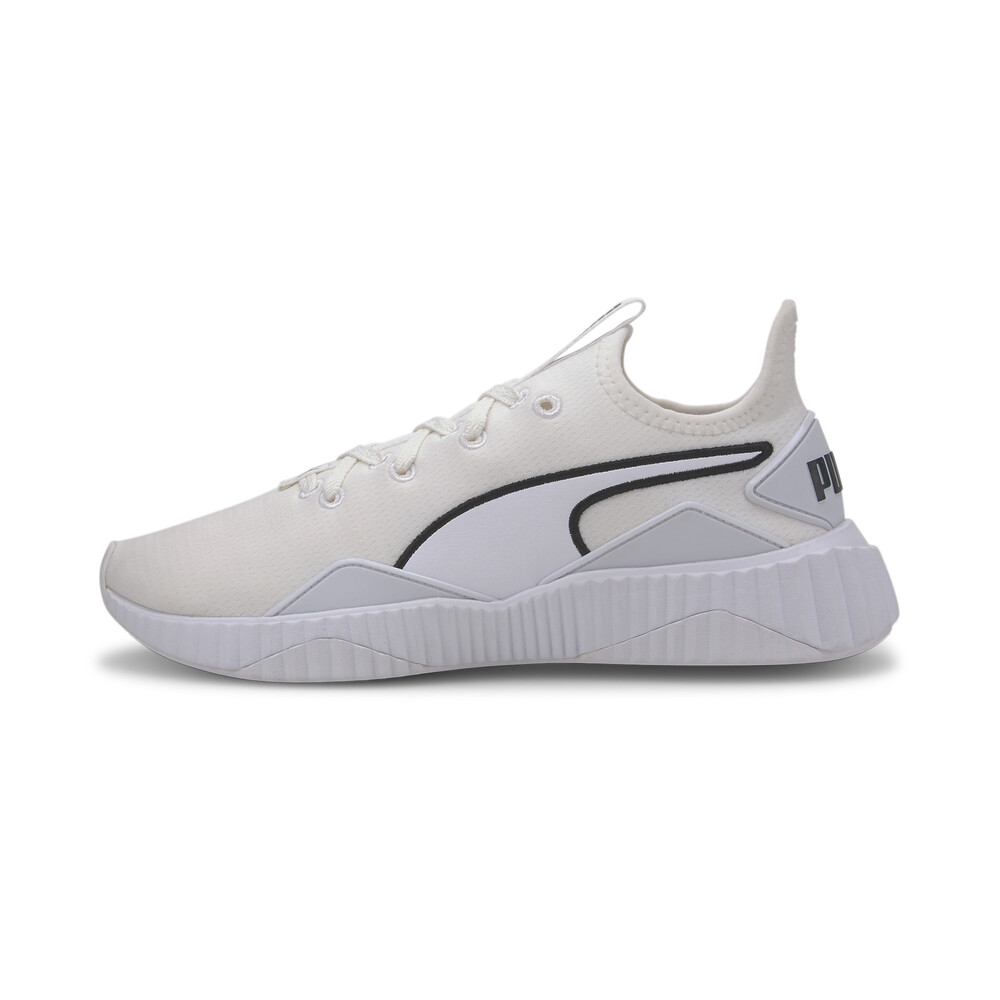 puma defy sneakers in white