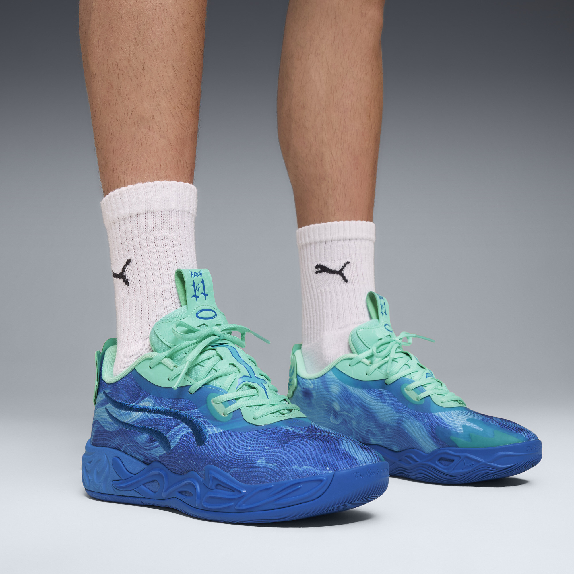 PUMA MB.04 Lo Team uniseks basketbalschoenen, Blauw, Maat 41 thumbnail 9