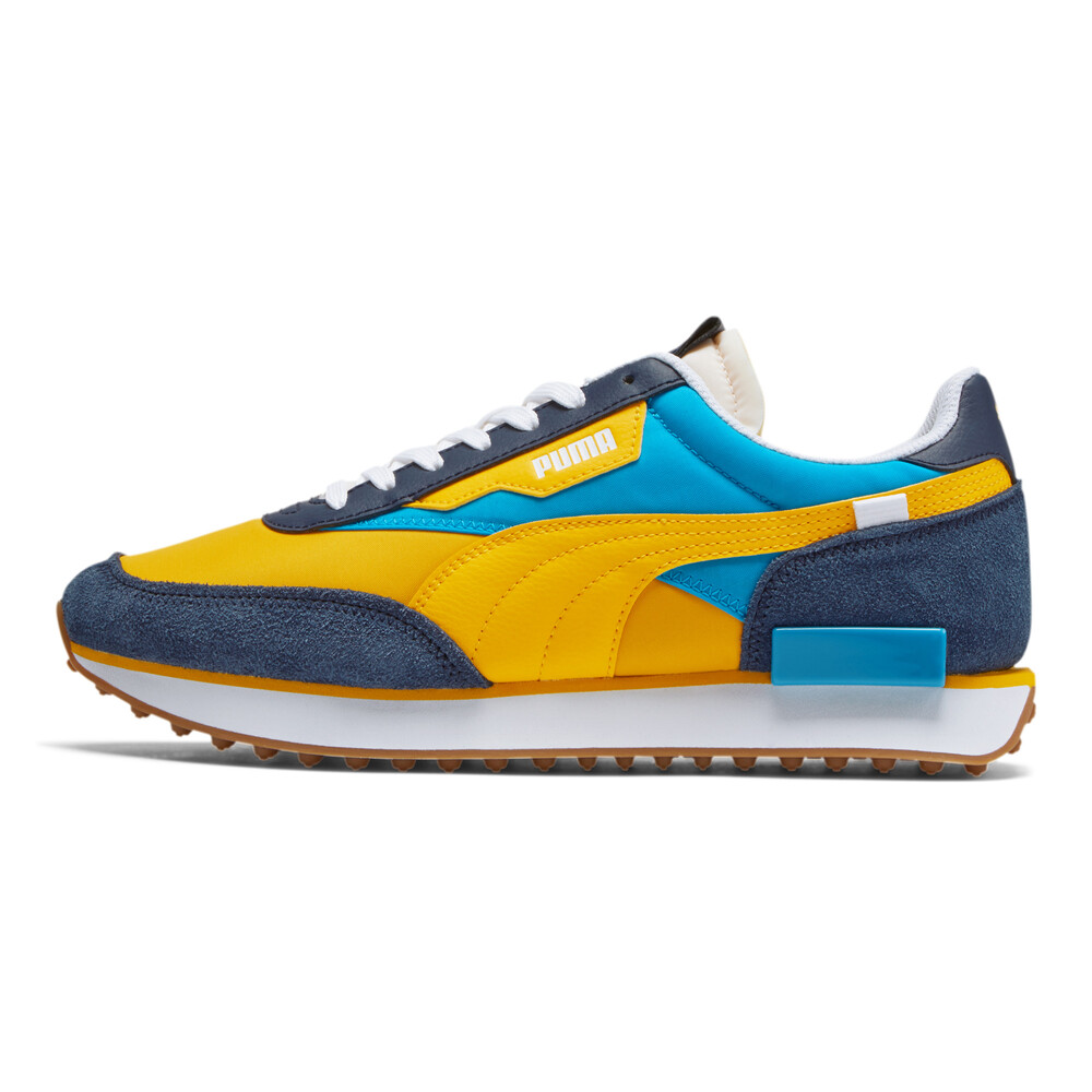 blue and yellow puma shoes