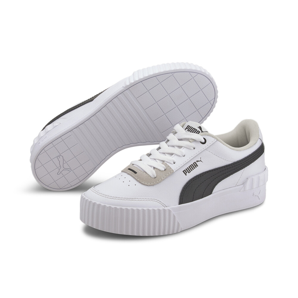 white puma carina sneakers