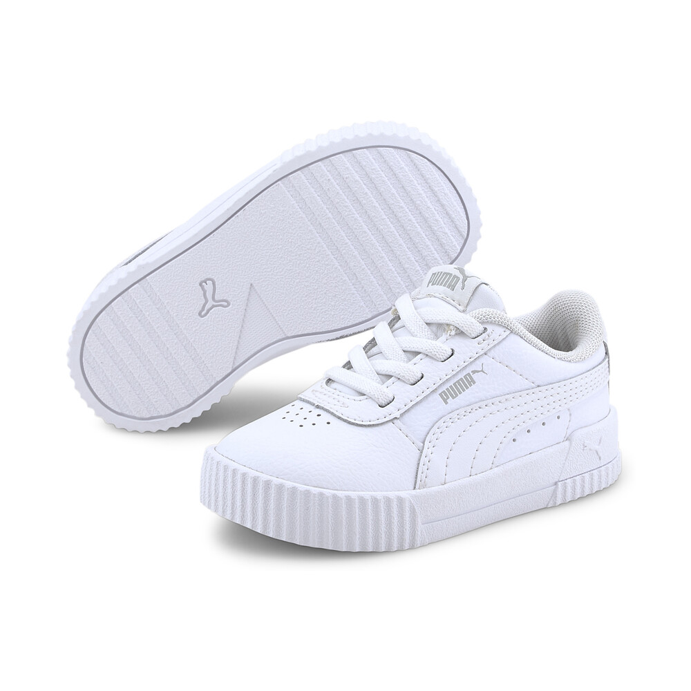 white puma carina sneakers