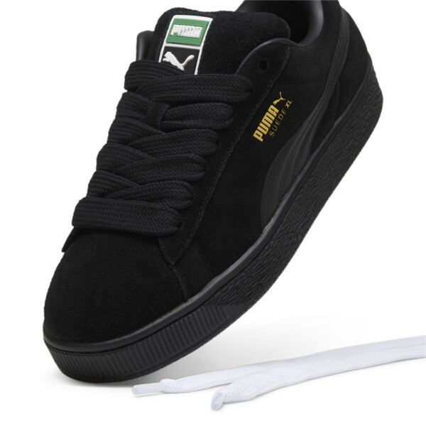 Puma suede negras 2025