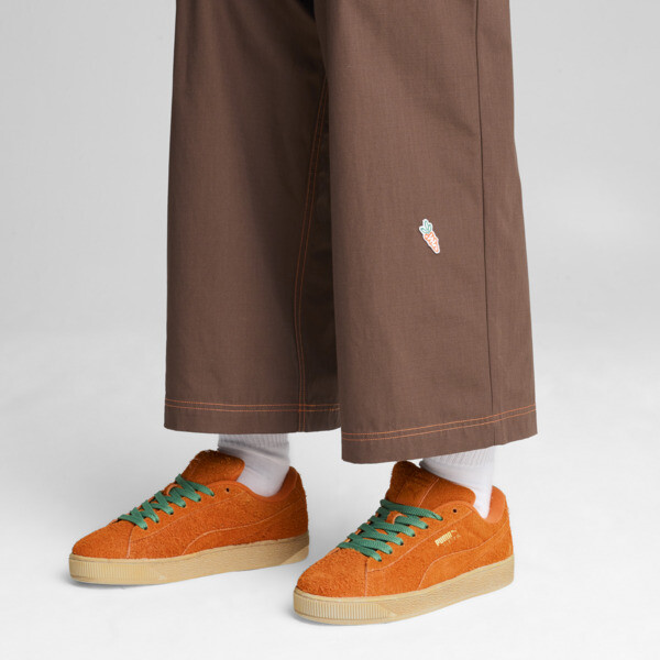 Orange puma shoes top