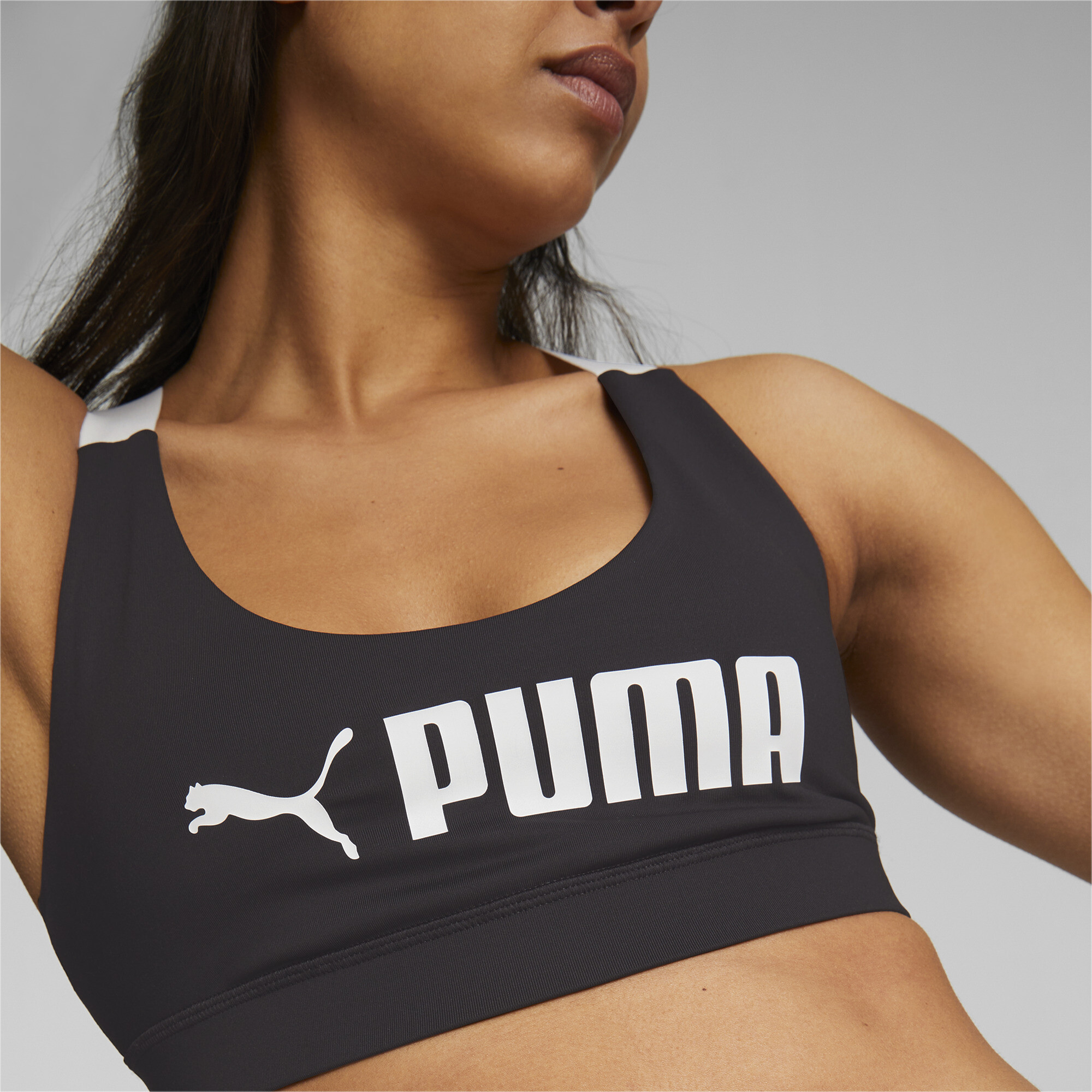 Women's PUMA Fit Mid Impact Training Bra In Black, Size XS