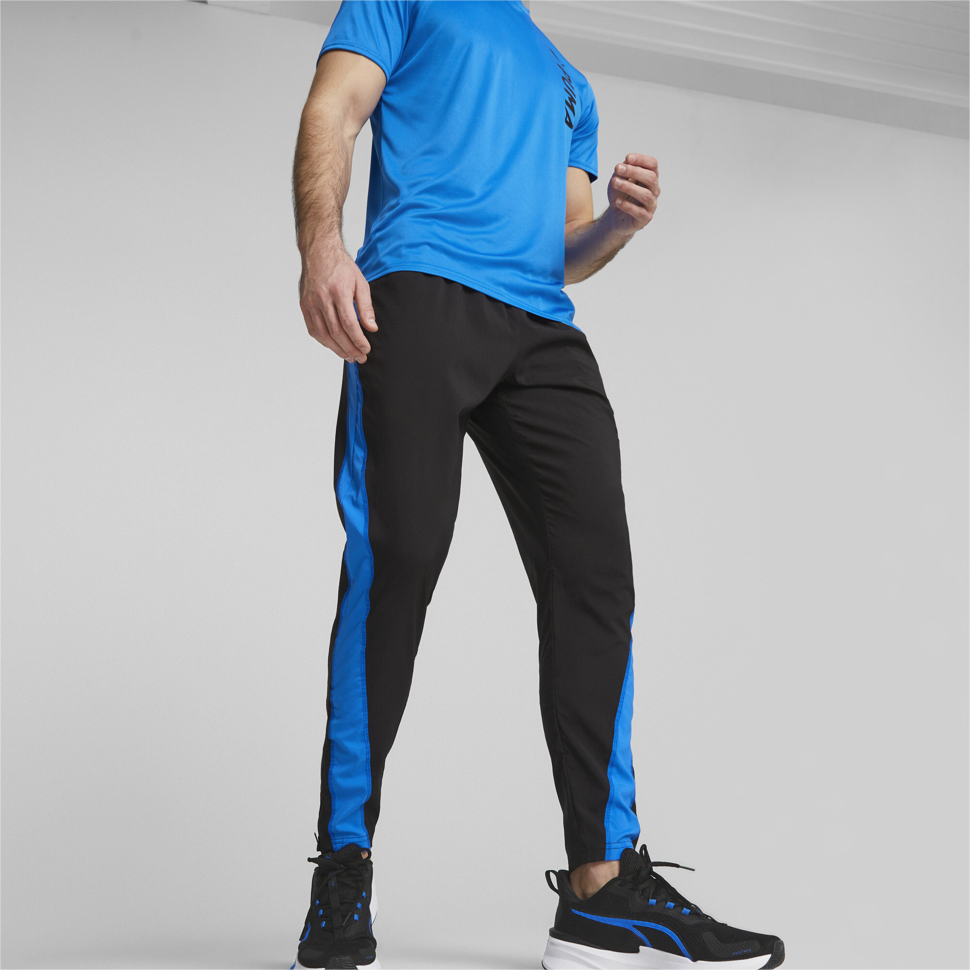 PUMA Pantalones Speed para hombre, Negro/Azul Real