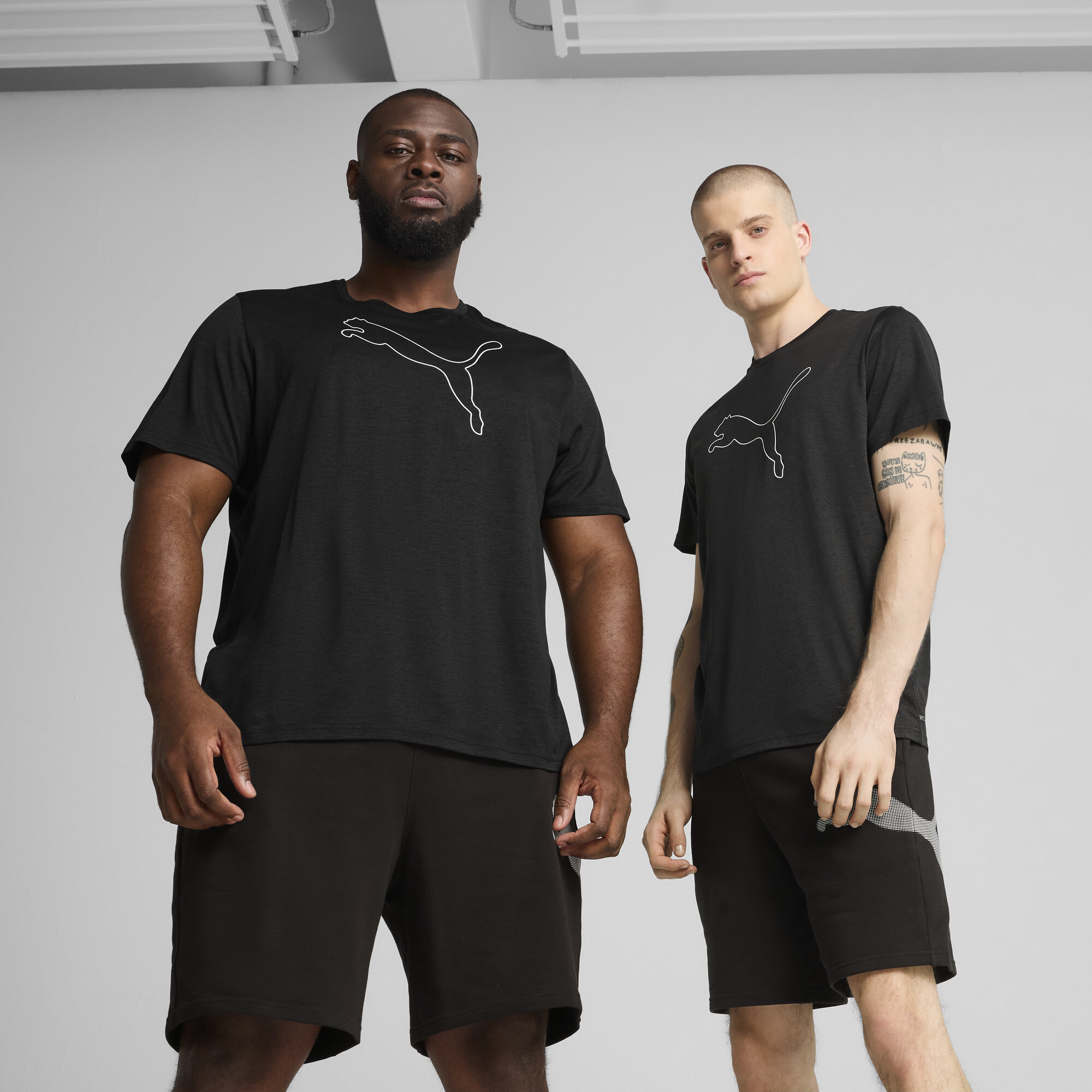 Polera Train All Day Essentials Cat para hombre