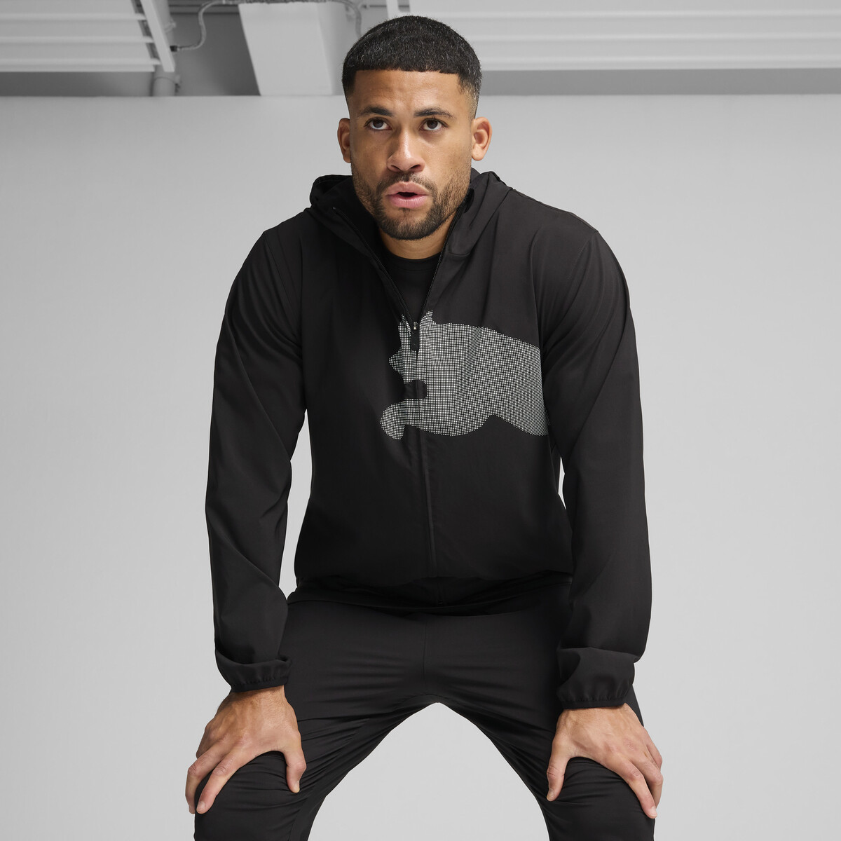 Train All Day Big Logo Woven Jacket Men in Black by PUMA, XS
