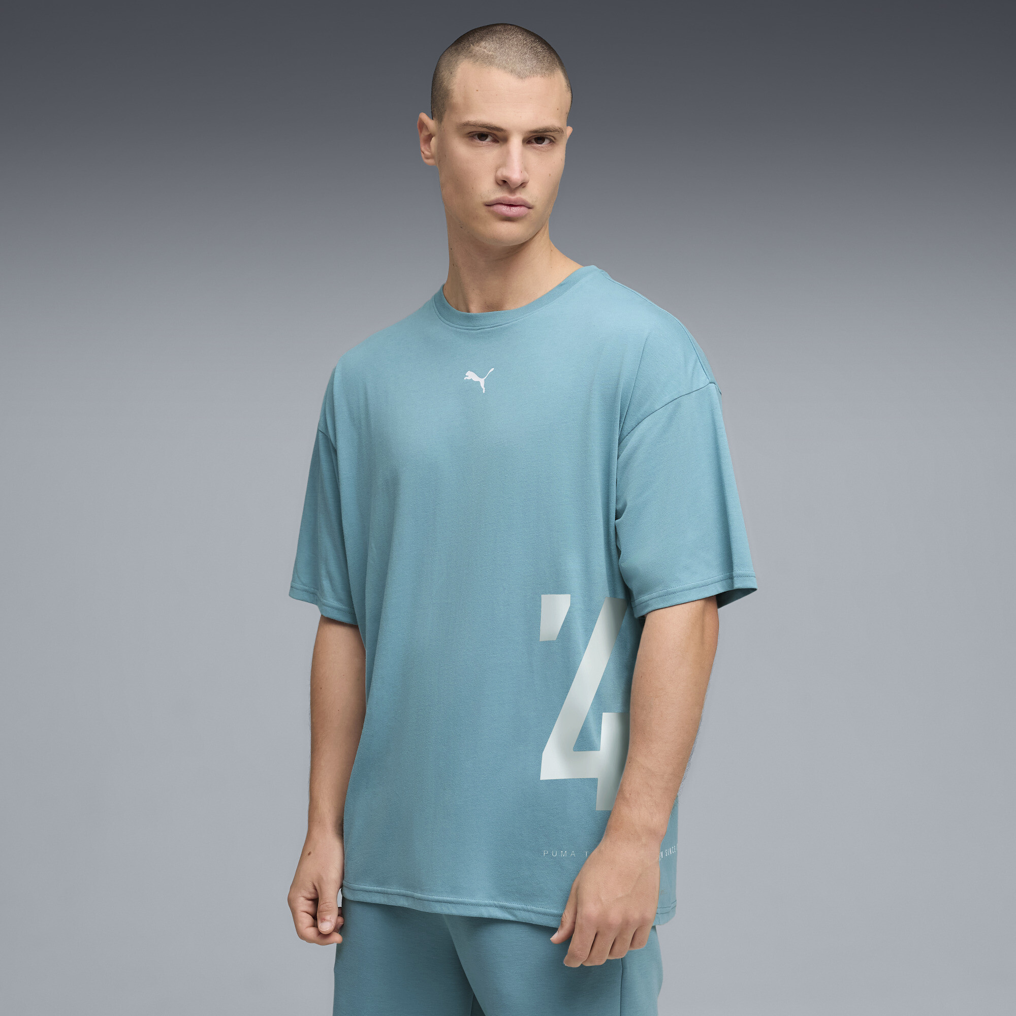 PUMA Graphics oversized trainingsshirt voor Heren, Blauw, Maat L