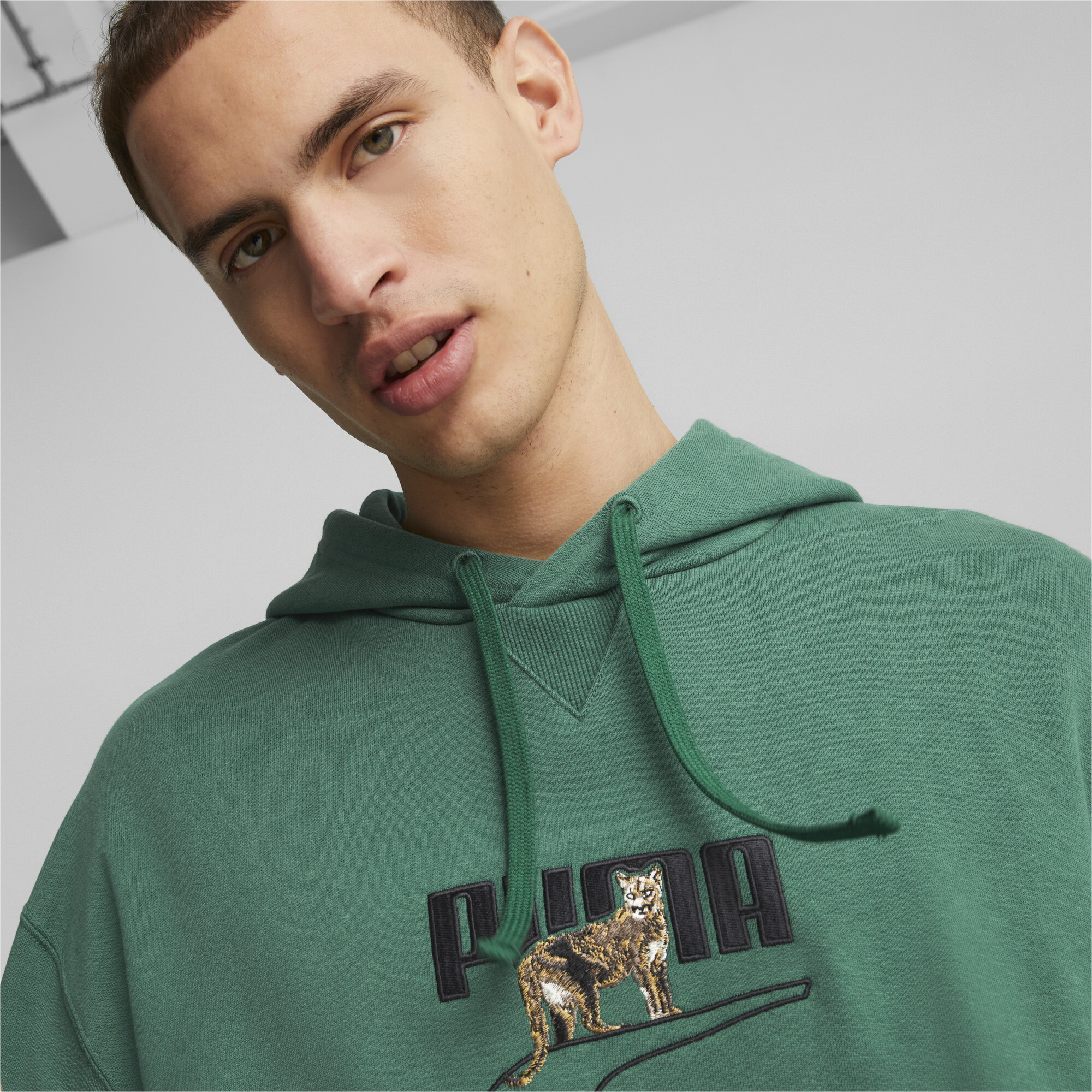 Men's PUMA DOWNTOWN Graphic Hoodie Men In Green, Size XS