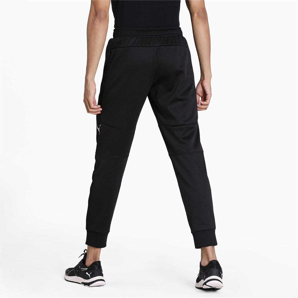 

PUMA - male - Штаны EVOSTRIPE Warm Pants – Puma Black –, Черный