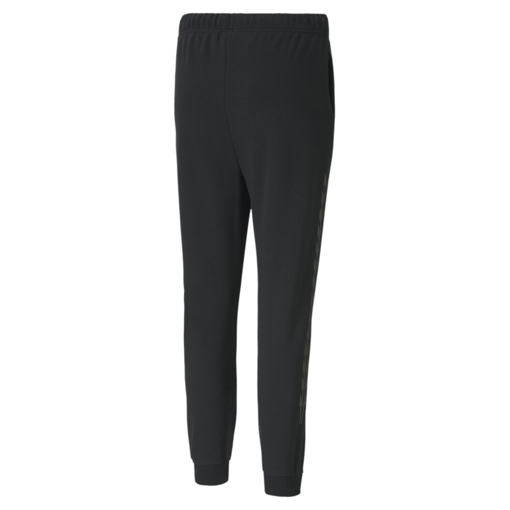 

PUMA - female - Штаны Evide Graphic Knitted Women's Track Pants – Puma Black-pink –, Черный