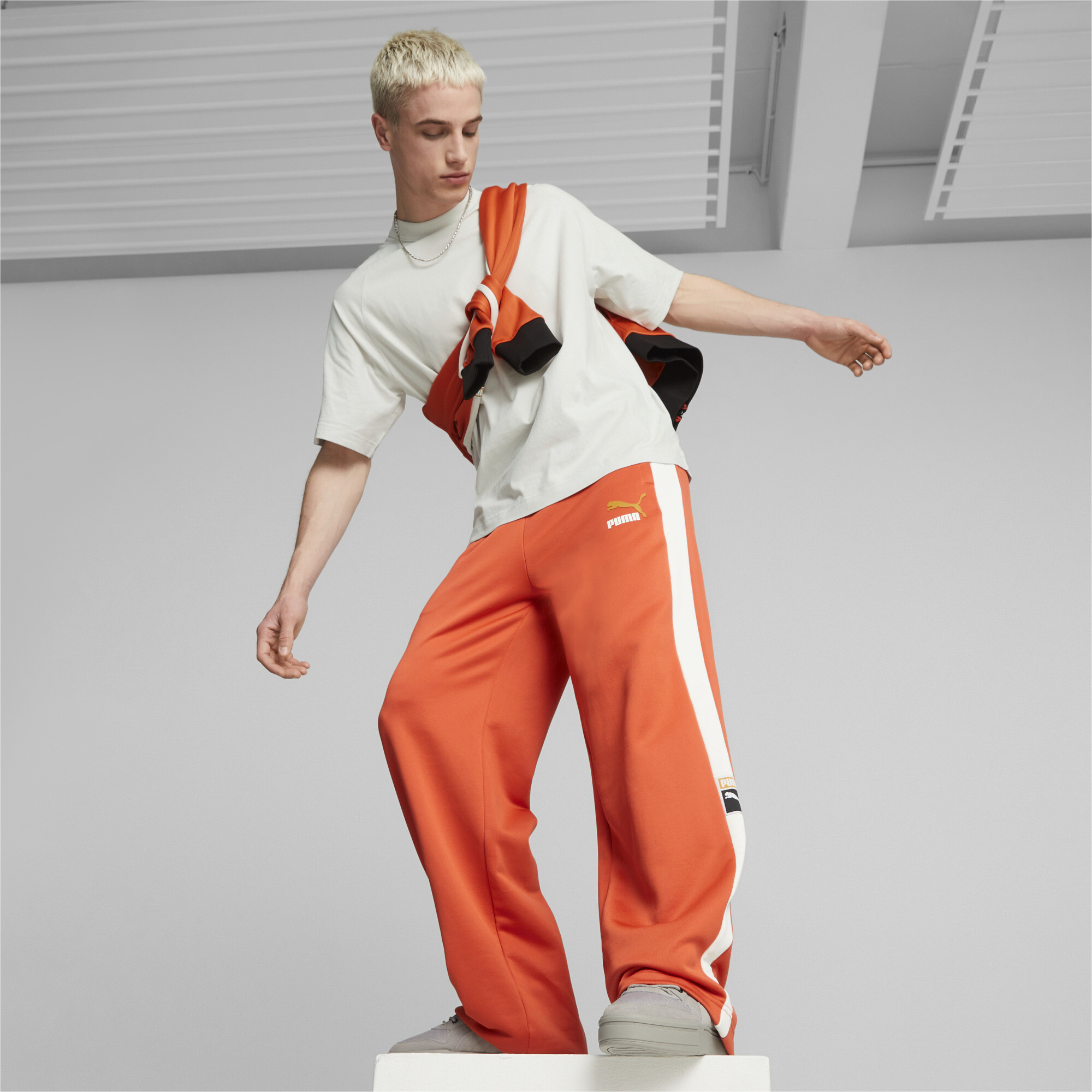 Men's PUMA T7 Track Pants In Orange, Size 2XL