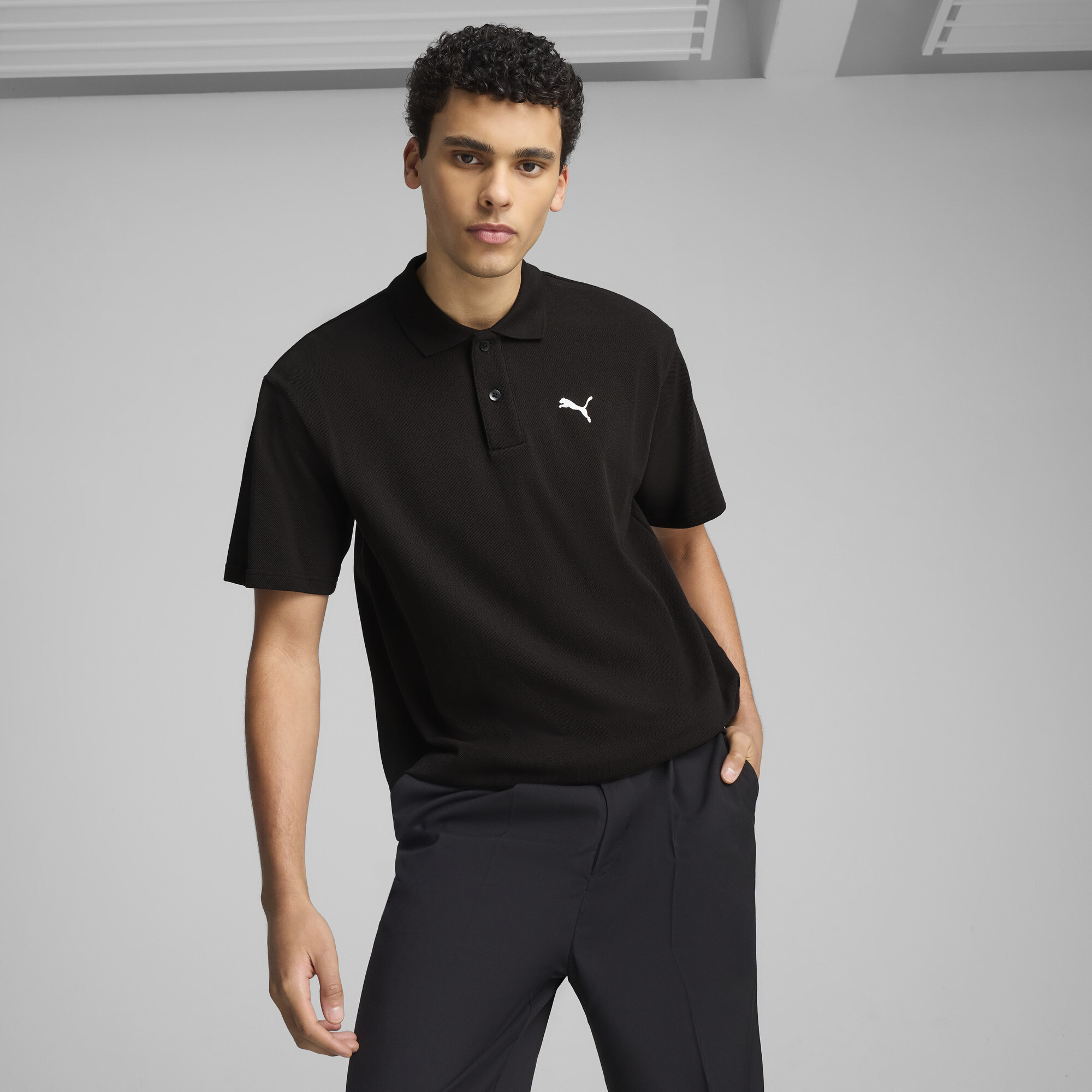 PUMA Wardrobe Essentials Men's Relaxed Pique Polo Shirt in Black, Size L