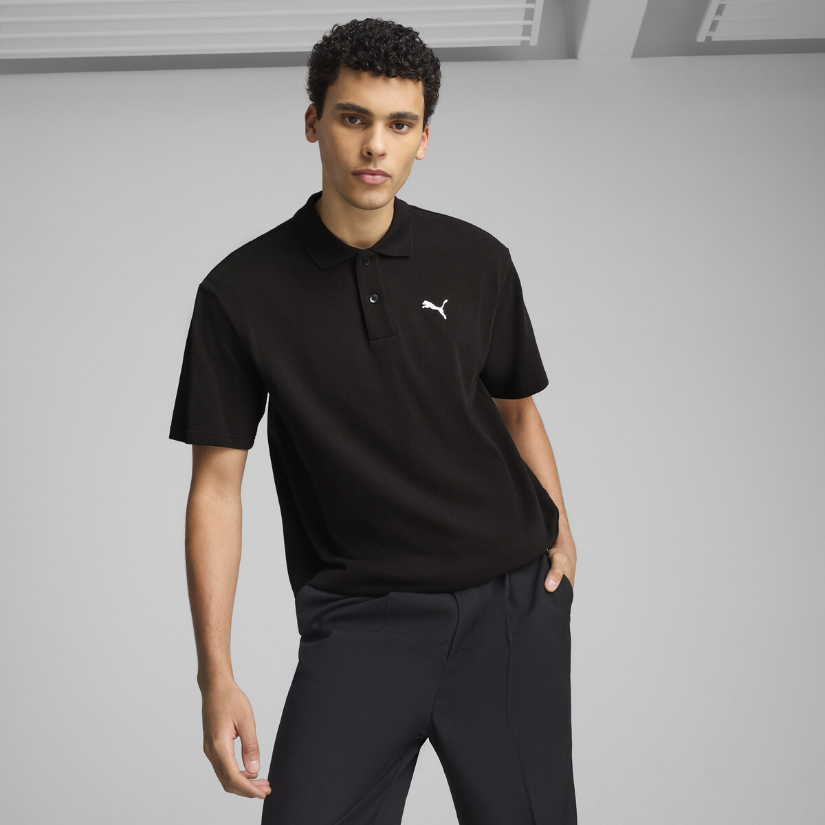 Wardrobe Essentials Pique Relaxed Polo Men in Black by PUMA, XS