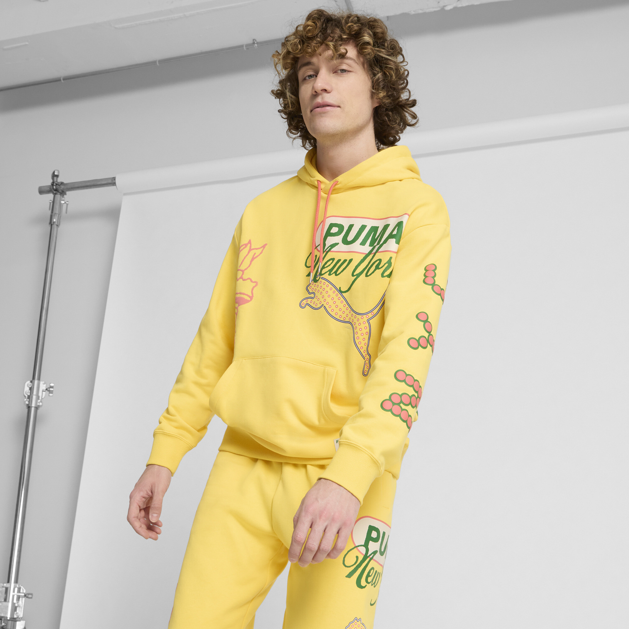 Puma Wardrobe Ess Hoodie Tr In Yellow