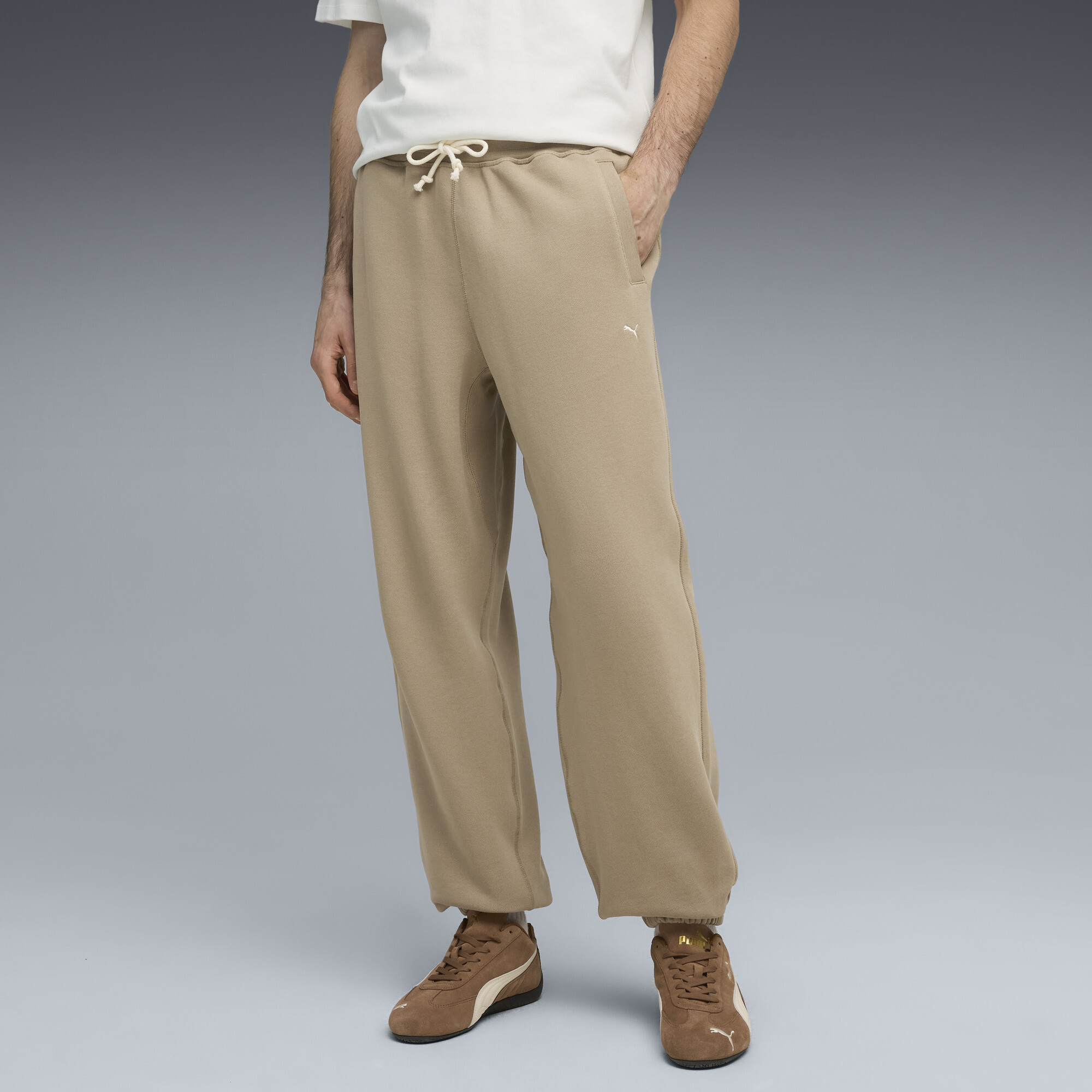 Puma Mmq Men's Relaxed Sweatpants In Neutral