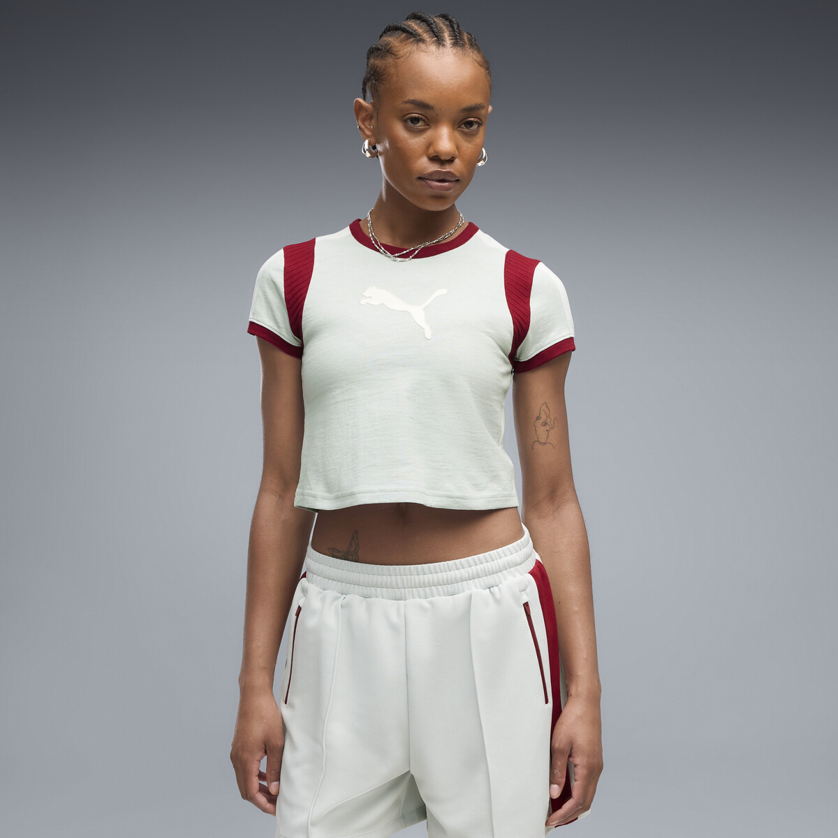 Graphic Slim Ringer Baby T-Shirt Women in Créme De Mint/Garnet Glow by PUMA, XS