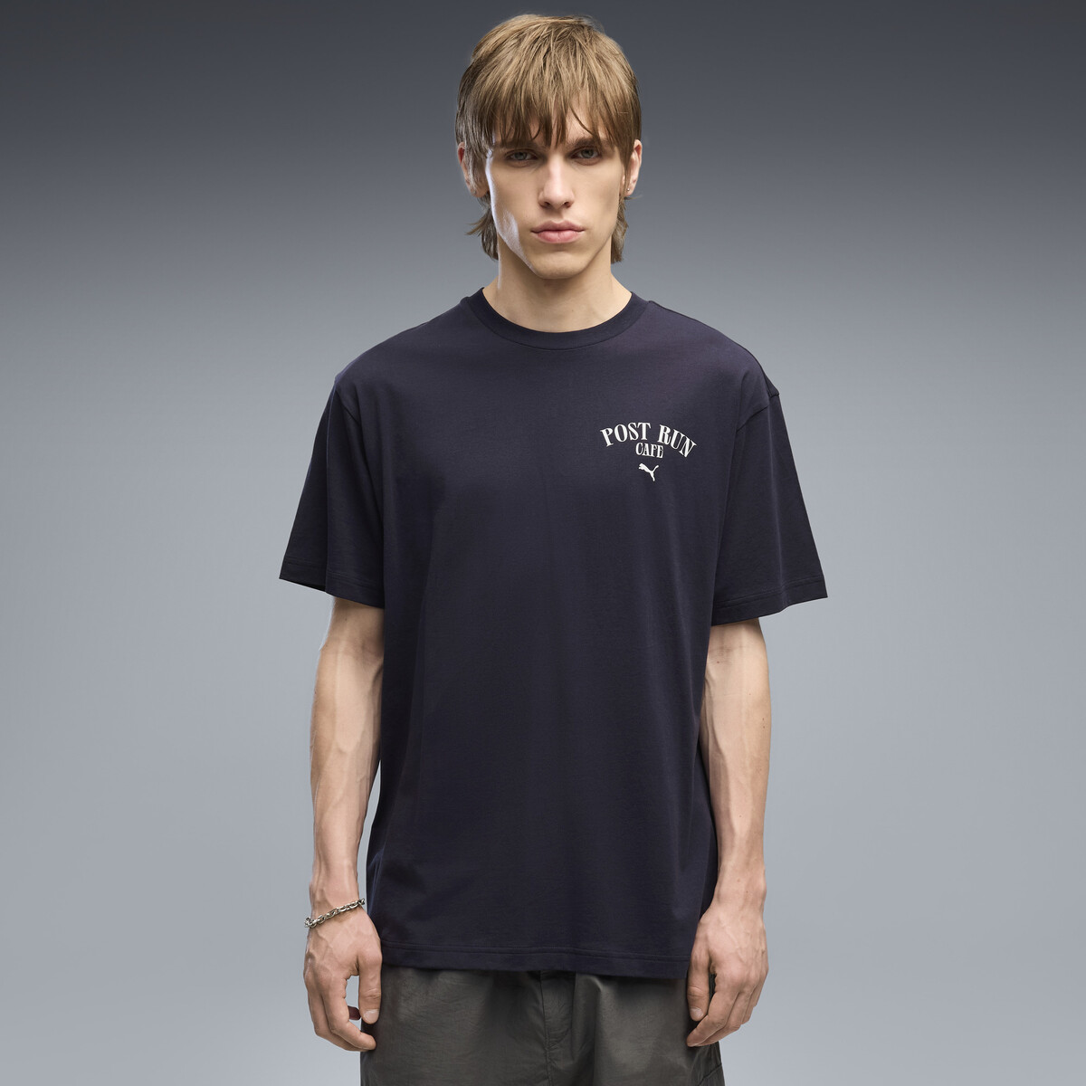 Graphic PUMA Cafe Relaxed T-Shirt Men in New Navy, Medium