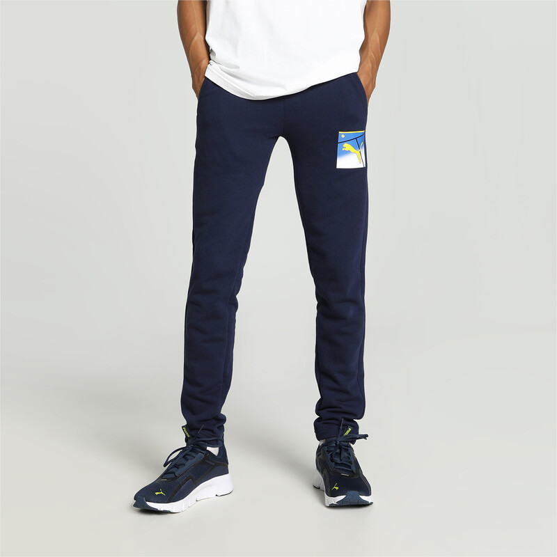 Men's PUMA Sport Graphic Slim Fit Pants in Blue size S