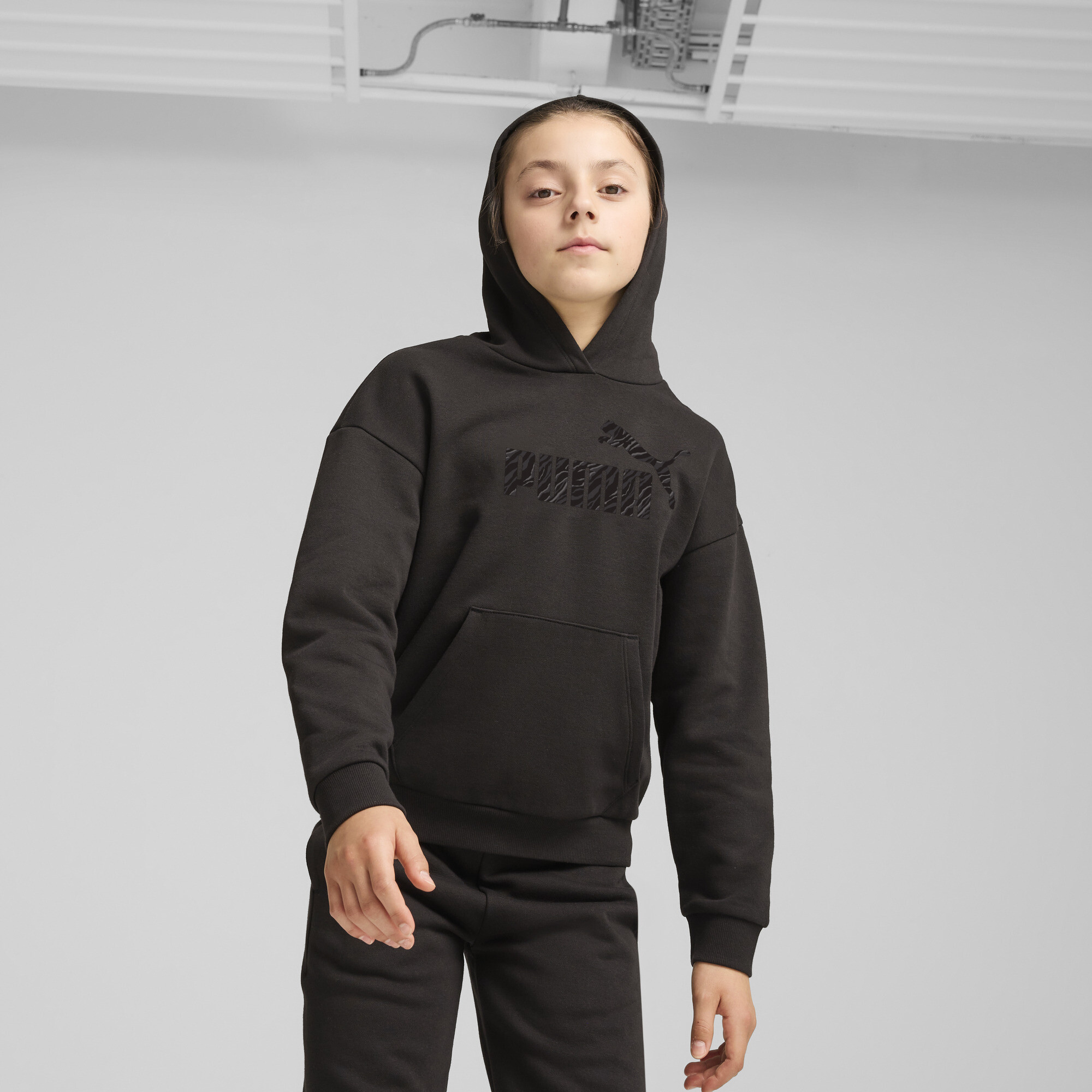 Puma ESS+ ANIMAL Hoodie Teenager Für Damen Für Kinder | Mit Animal Print | Black | Größe: 9-10Y