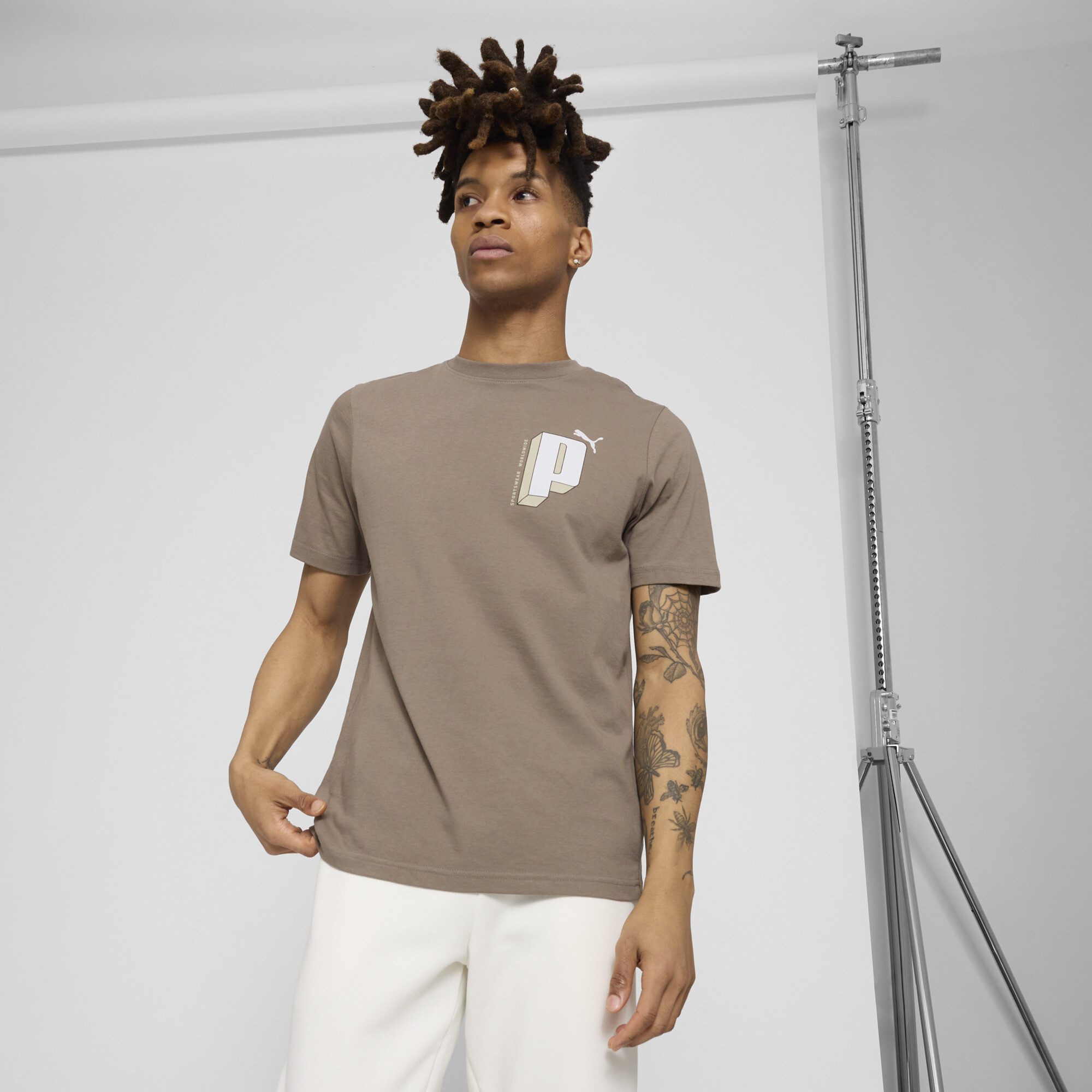 PUMA GRAPHICS Letter Men's T-Shirt in Brown, Size S
