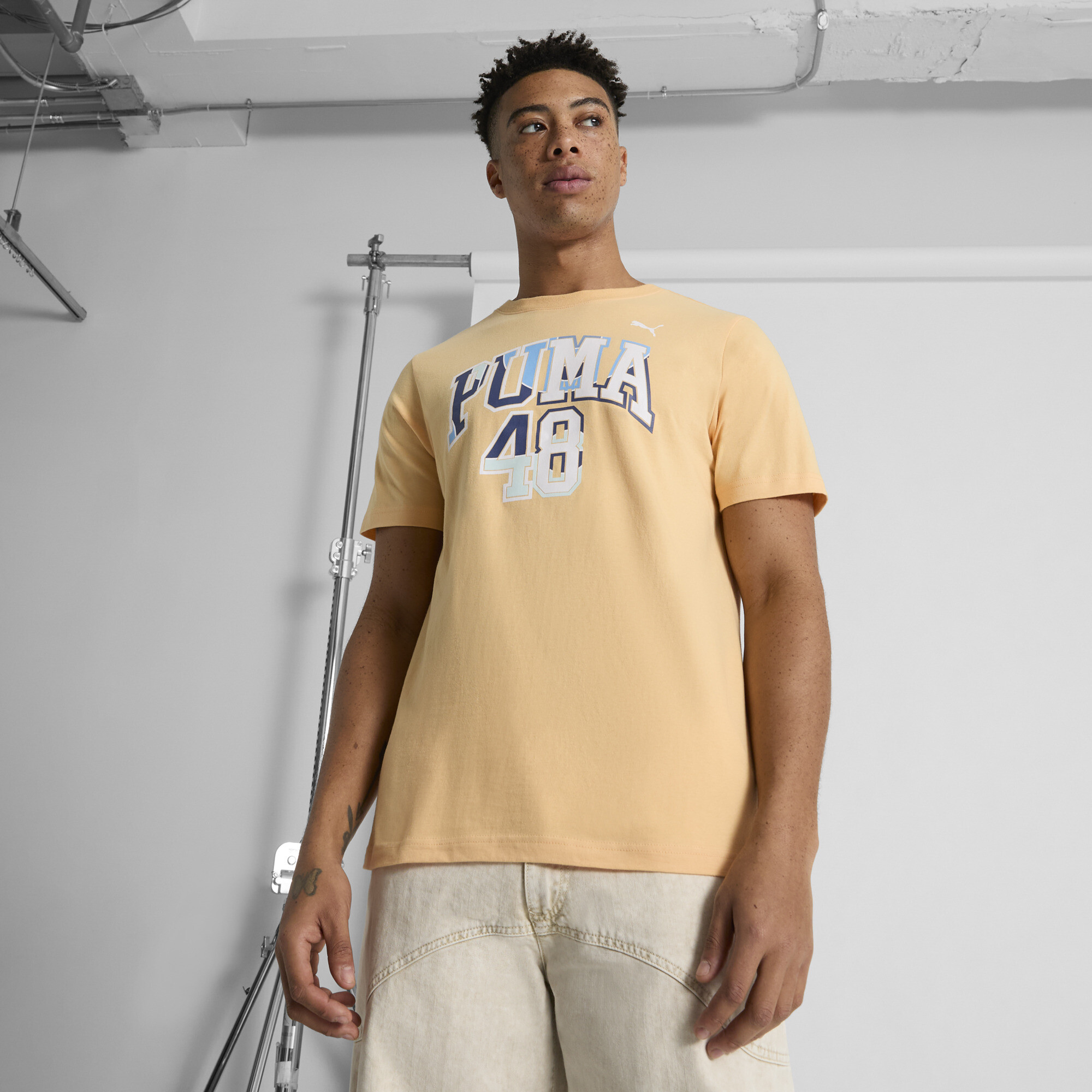 PUMA GRAPHICS Varsity Men's T-Shirt in Orange, Size XL