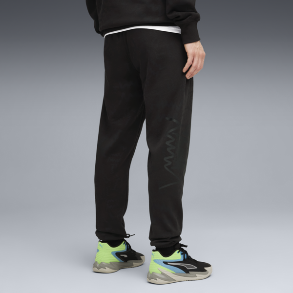 Jogging de básquet teamJAWS Post Game para hombre, PUMA Black, large-ARG