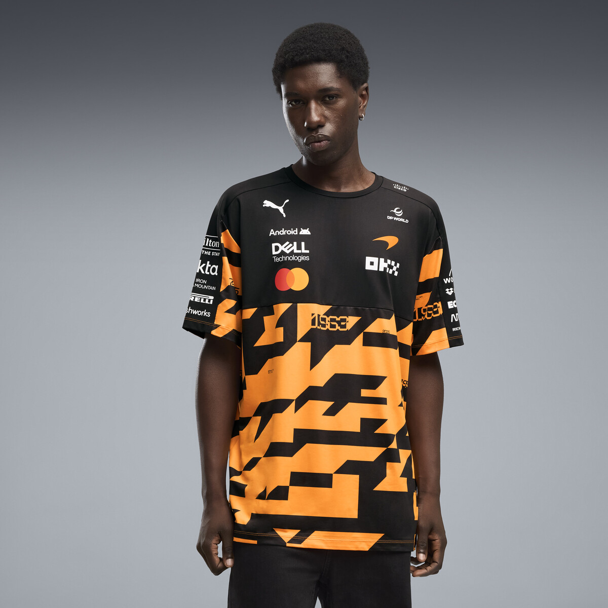 McLAREN MASTERCARD F1 TEAM 1000th Grand Prix Replica T-Shirt Men in Papaya by PUMA, Small