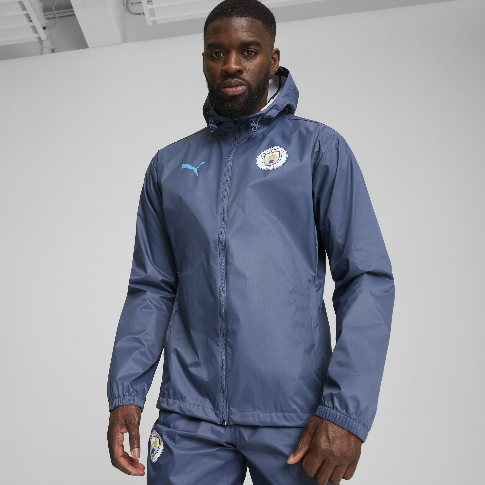 Puma Manchester City All-Wetter-Trainingsjacke Herren | Inky Blue/Magic Blue | Größe: L