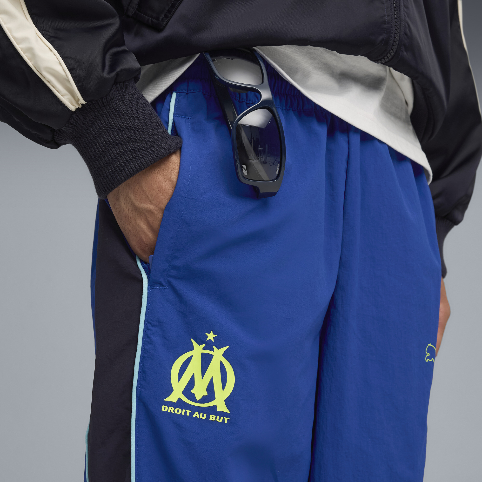 PUMA Olympique de Marseille ftblESSENTIALS Cellerator broek voor Heren, Blauw/Geel, Maat XL thumbnail 5