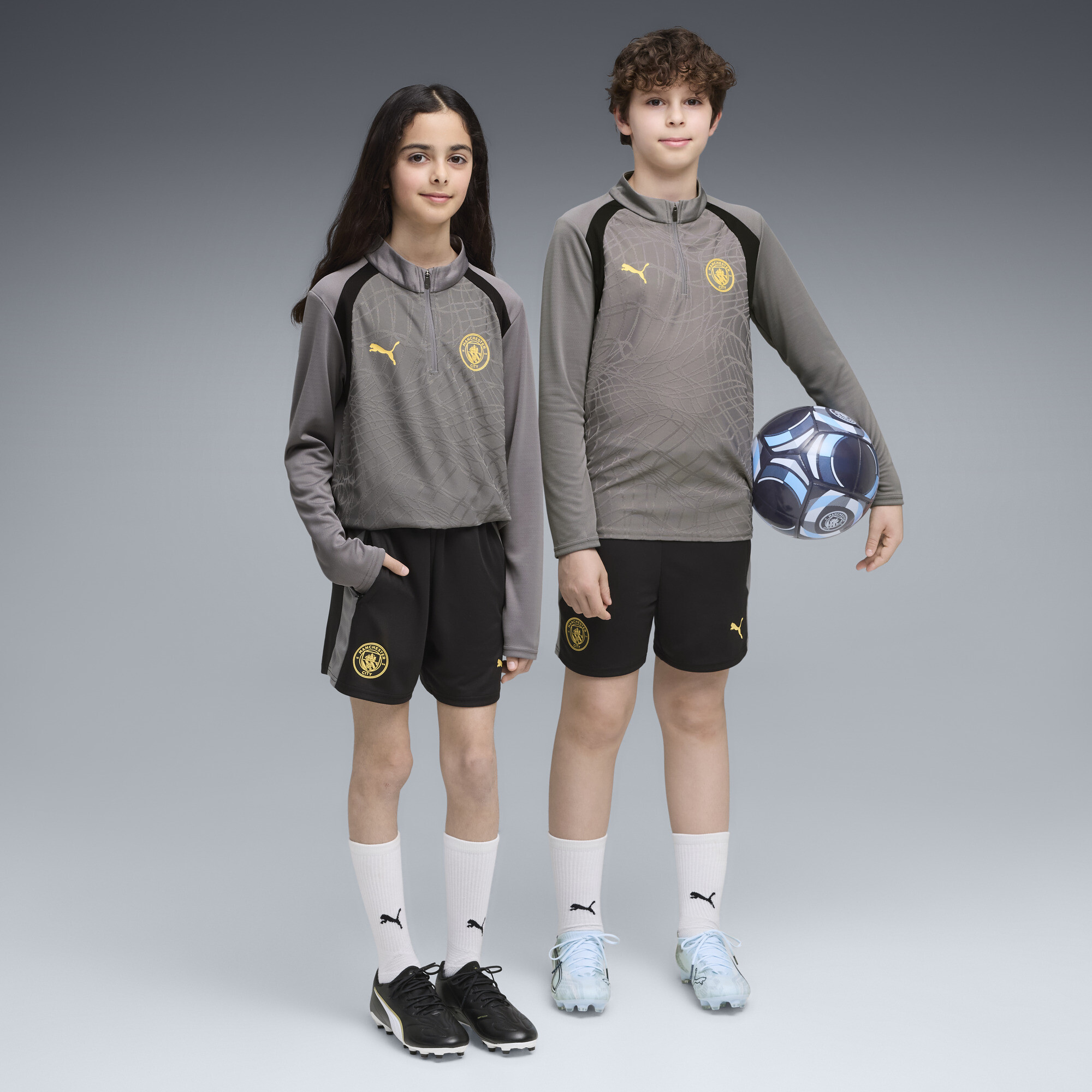 PUMA Short dentranement Manchester City Enfant et Adolescent Vtements Noir 9-10Y 40 €