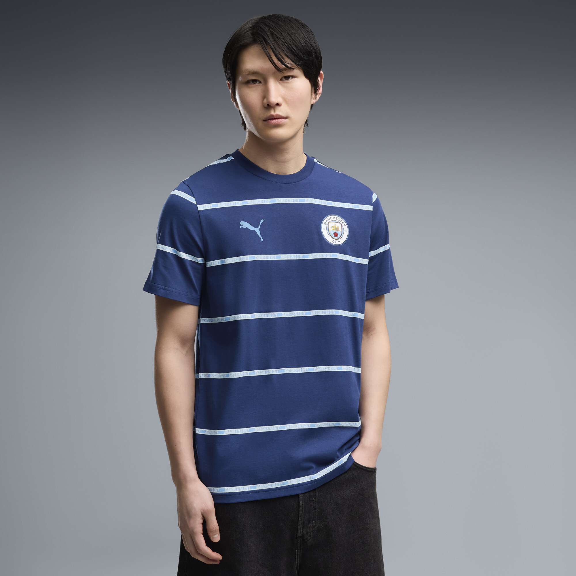 PUMA T shirt à imprimés ftblCulture Manchester City Homme Vêtements