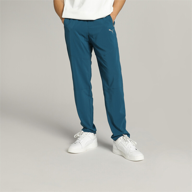 Men's PUMA Tapered Woven Running Trackpants in Ocean Tropic size M